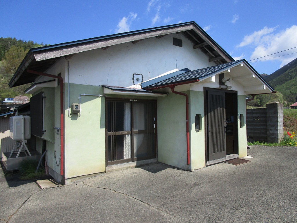 1960s wood house with outbuildings in Iwate