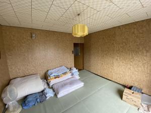 1970s wood house with outbuildings in Niigata