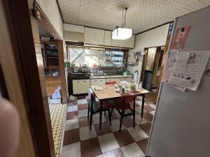 1960s wood house with storehouses in Niigata