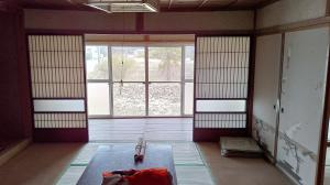 1940s wood house with outbuildings in Niigata