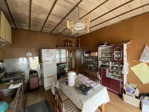 1970s wood house with outbuildings in Niigata