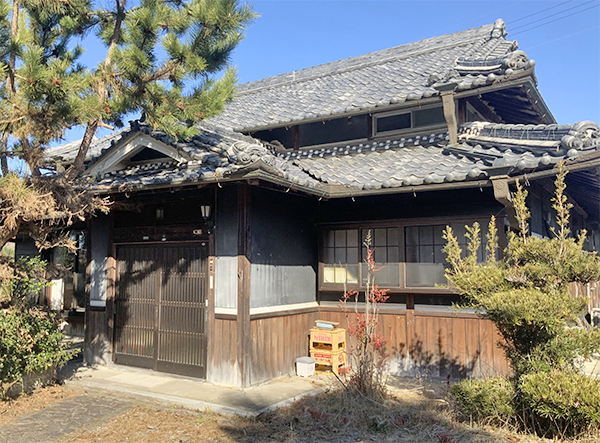 Spacious old farmhouse with attached field, surrounded by peaceful scenery