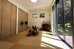 Bright quiet corner property with two-sided wide wood terrace and hot spring water inlet possibility, meticulously built new single-story house