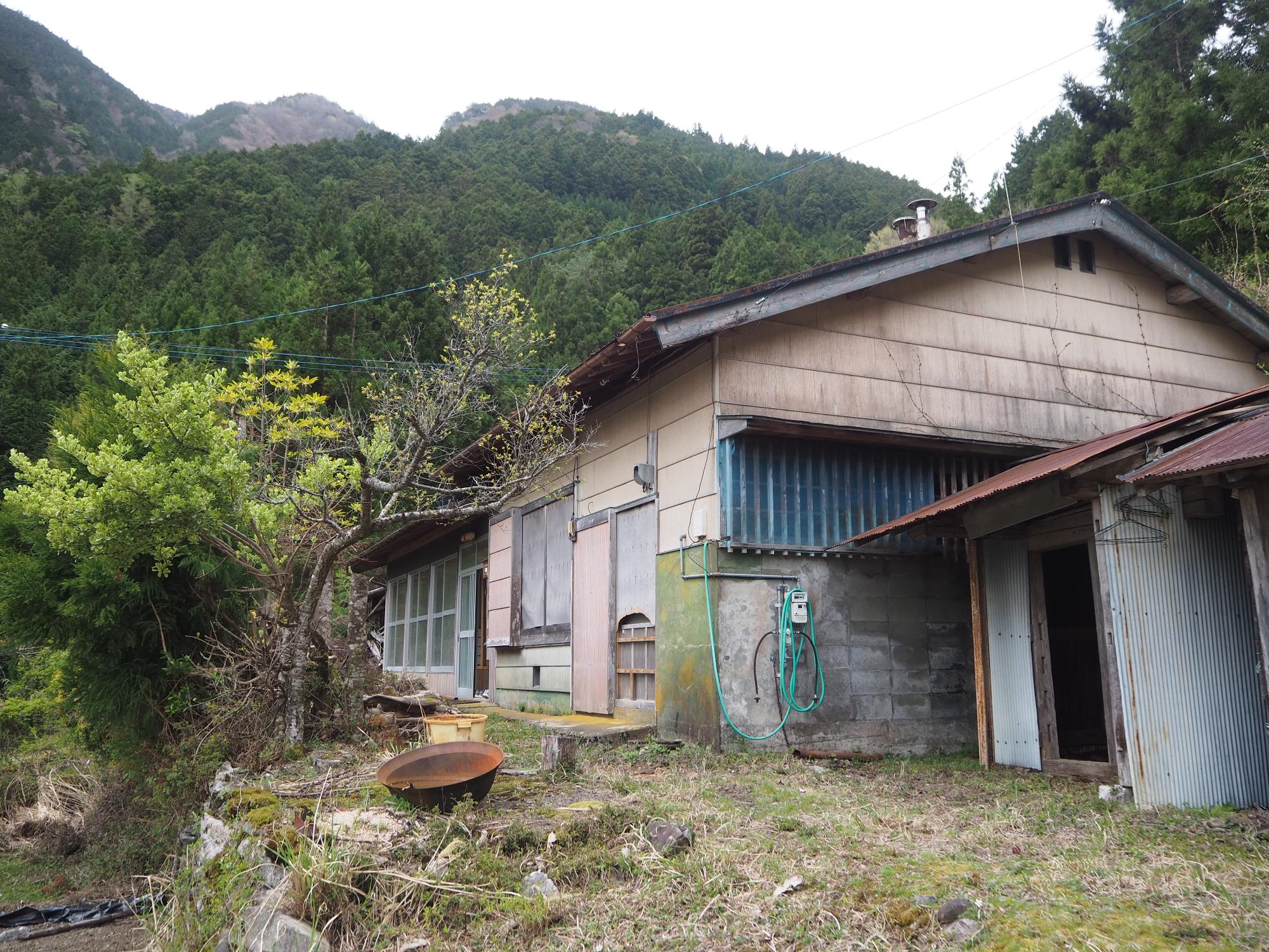 1960s wood house with outbuildings in Tokushima