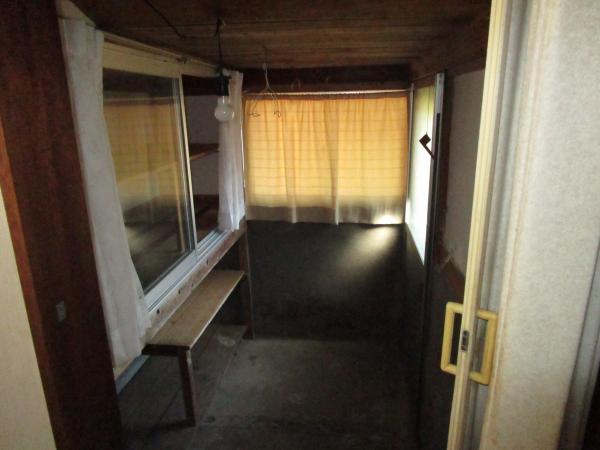 1970s wood house with storehouses in Oita