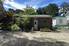 Bright quiet corner property with two-sided wide wood terrace and hot spring water inlet possibility, meticulously built new single-story house