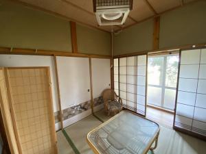 1970s wood house with outbuildings in Niigata