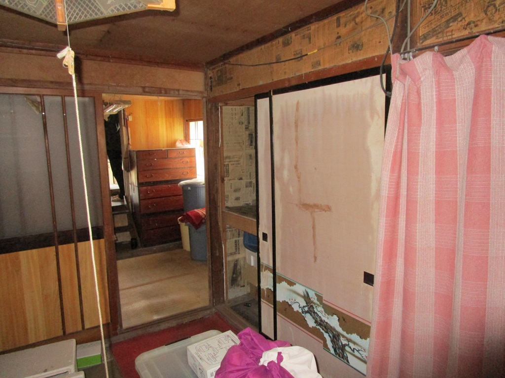 1960s wood house with outbuildings in Iwate