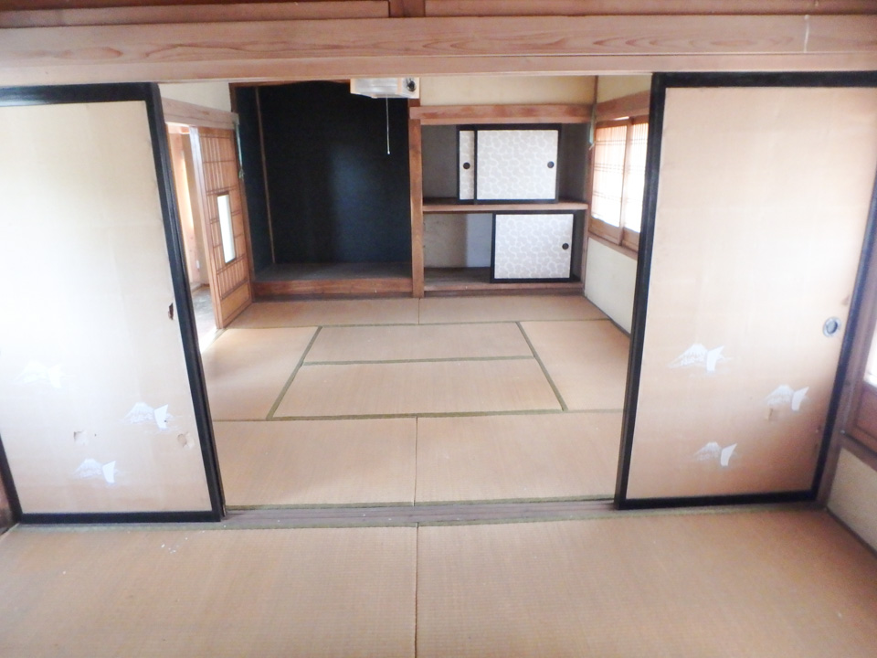 1950s wood house with outbuildings in Iwate