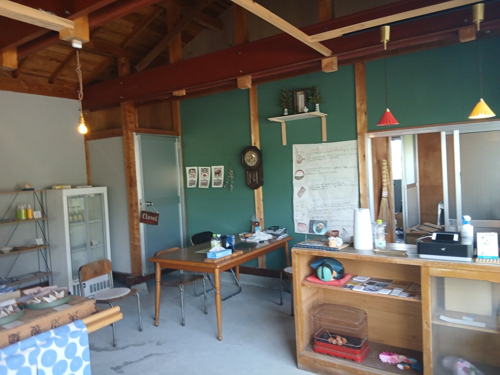 1970s wood house with outbuildings in Iwate