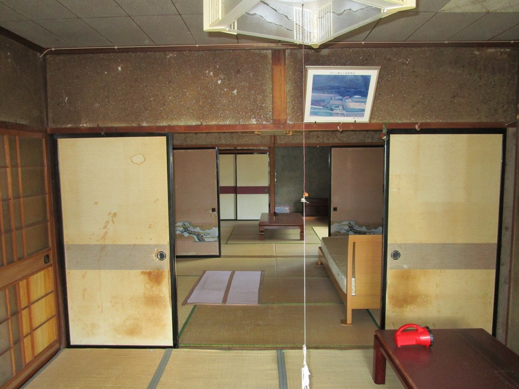 1960s wood house with outbuildings in Iwate
