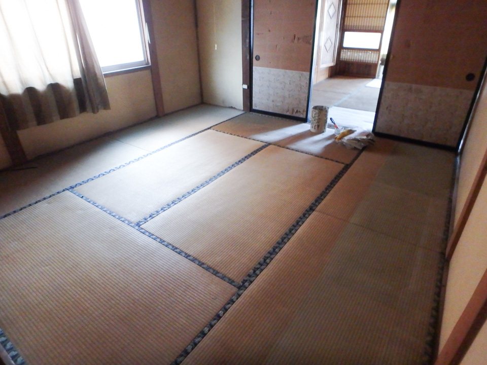1950s wood house with outbuildings in Iwate