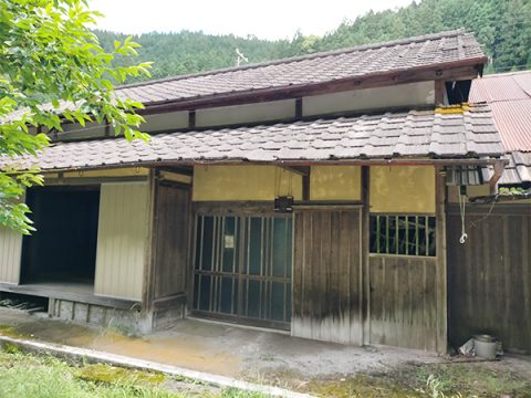 Charming traditional old house with a small stream flowing nearby