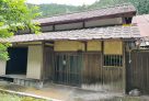 Charming traditional old house with a small stream flowing nearby