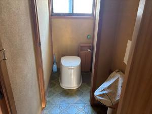 Property No. 81 - Convenient Shopping! A Small Shed Property with DIY Potential