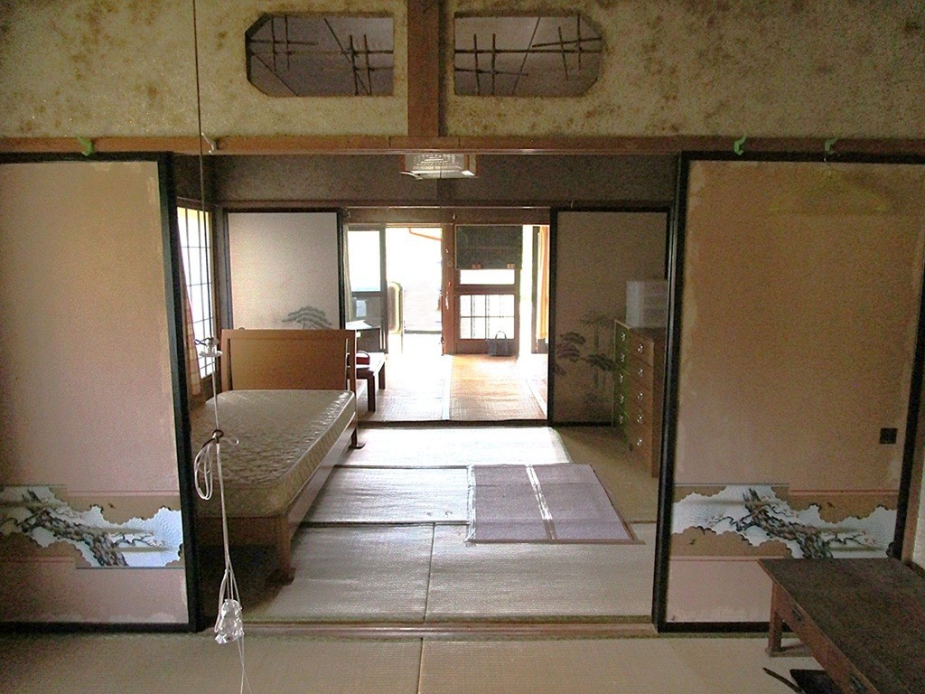 1960s wood house with outbuildings in Iwate