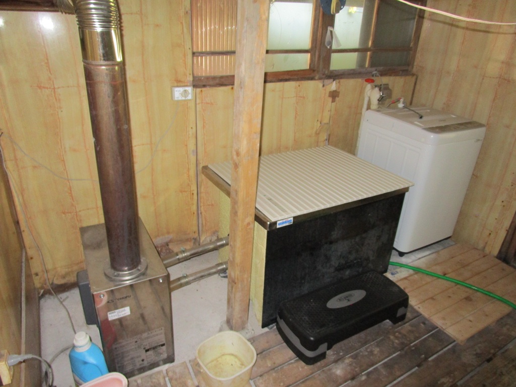 1960s wood house with outbuildings in Iwate