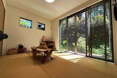 Bright quiet corner property with two-sided wide wood terrace and hot spring water inlet possibility, meticulously built new single-story house