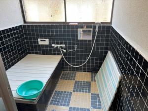 Property No. 81 - Convenient Shopping! A Small Shed Property with DIY Potential