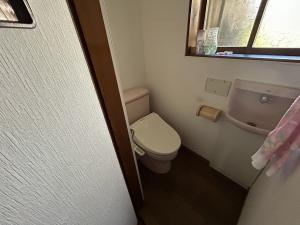 1960s wood house with storehouses in Niigata