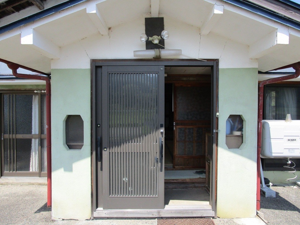 1960s wood house with outbuildings in Iwate