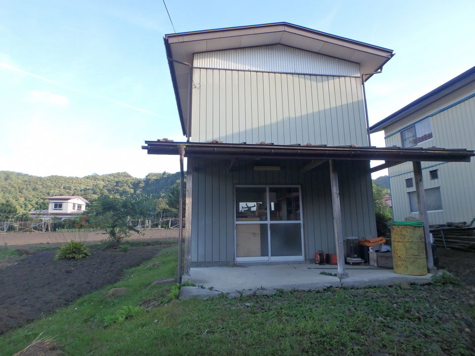 1950s wood house with outbuildings in Iwate