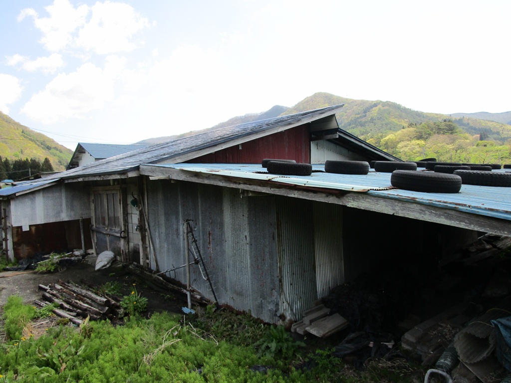 1960s wood house with outbuildings in Iwate