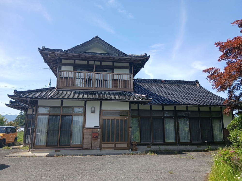 1970s wood house with outbuildings in Iwate