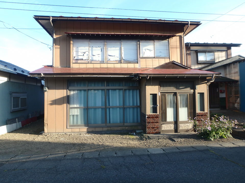 1950s wood house with outbuildings in Iwate
